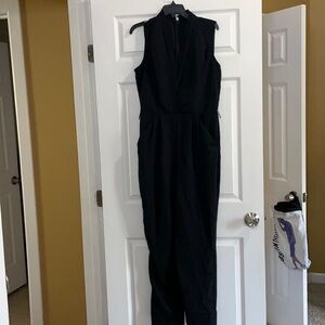 Black Jumpsuit with gold chain belt